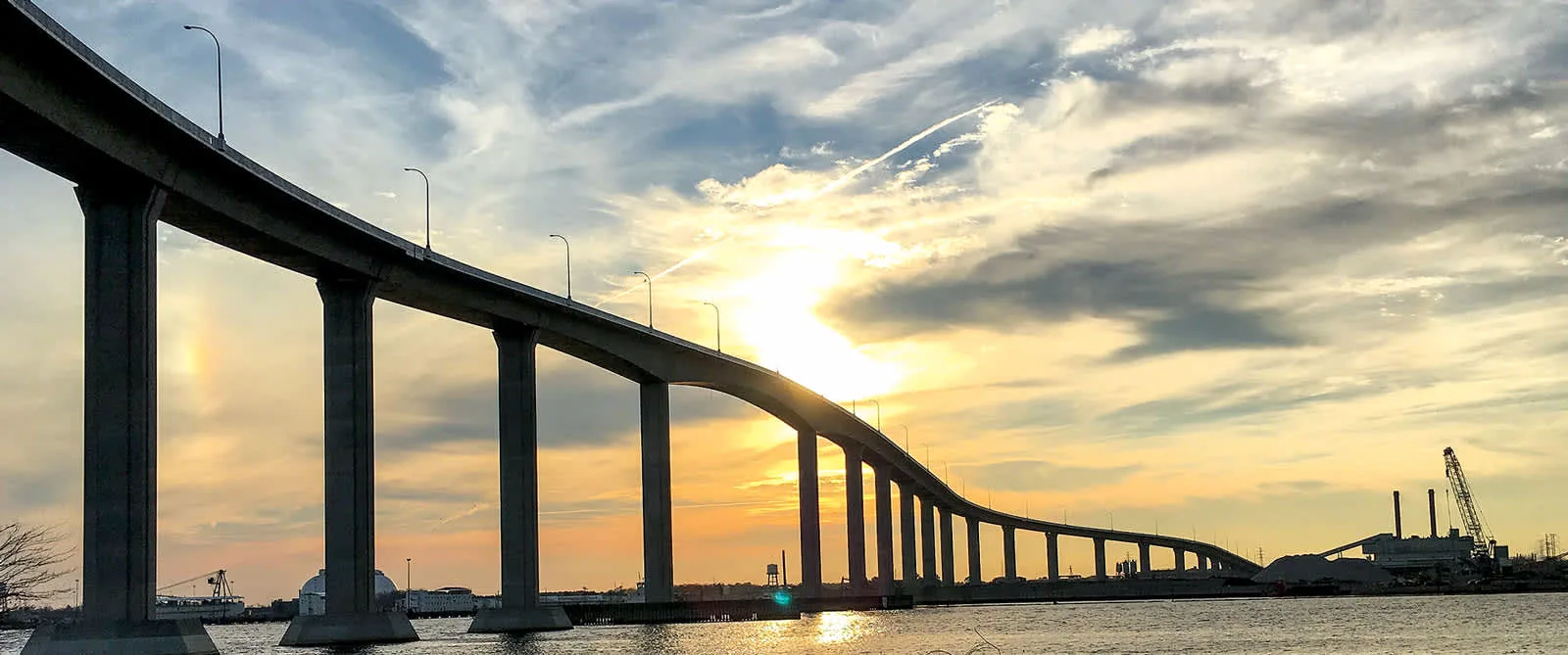 Commercial Roofing Chesapeake in Chesapeake Bridge at sunset near Chesapeake